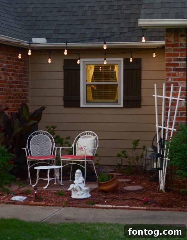 Enbrighten cafe lights providing warm illumination to a backyard setting