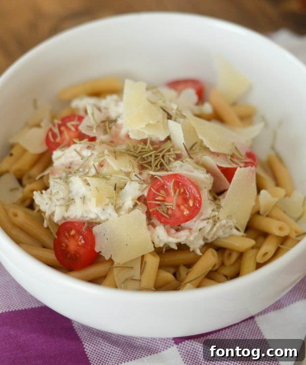 A beautifully presented Chicken Salad Pasta Bowl, ready for a meal.