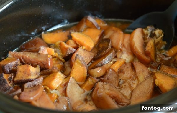 Maple chicken drumsticks cooking in a slow cooker