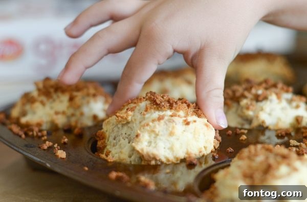 A Grape-Nuts muffin cut in half, revealing the banana and cereal texture