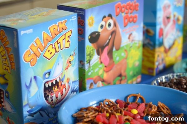 Parents and children gathered around a table, playing a vibrant board game from Goliath Games. #FamilyGameNight