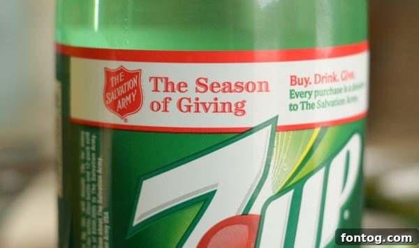 Ingredients for Cranberry Orange Punch laid out on a table, including Cranberry Sprite, Orange Hawaiian Punch, Halos oranges, dried cranberries, and orange sherbet.