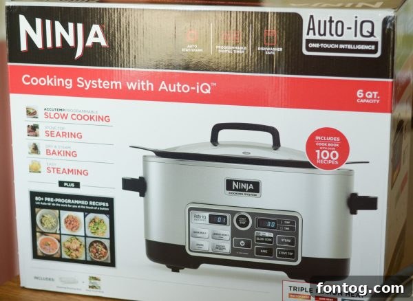 Ninja Cooking System with Auto-iQ cooking a pot of BBQ chicken and beans