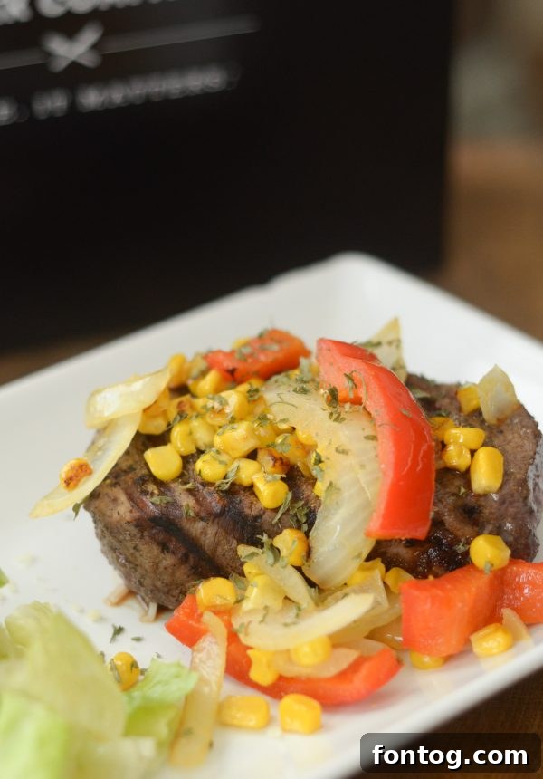 Delicious Veggie Topped Filet Mignon from Kansas City Steak Company for holiday dinner