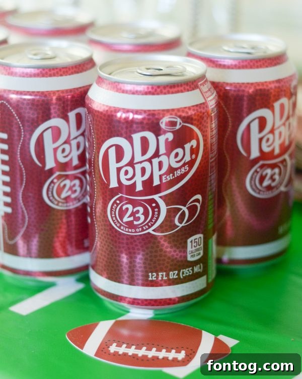 Touchdown Bites: Hosting the Ultimate Homegate with a Football Cheese Board 4 Close up of Dr Pepper cans and football party decorations