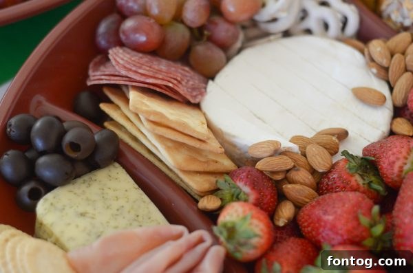Touchdown Bites: Hosting the Ultimate Homegate with a Football Cheese Board 8 Close up of a football cheese board with gluten-free options
