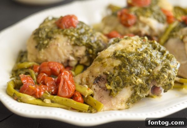 Instant Pot Pesto Chicken served with fresh vegetables