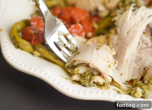 Close-up of Instant Pot Pesto Chicken with vibrant pesto sauce