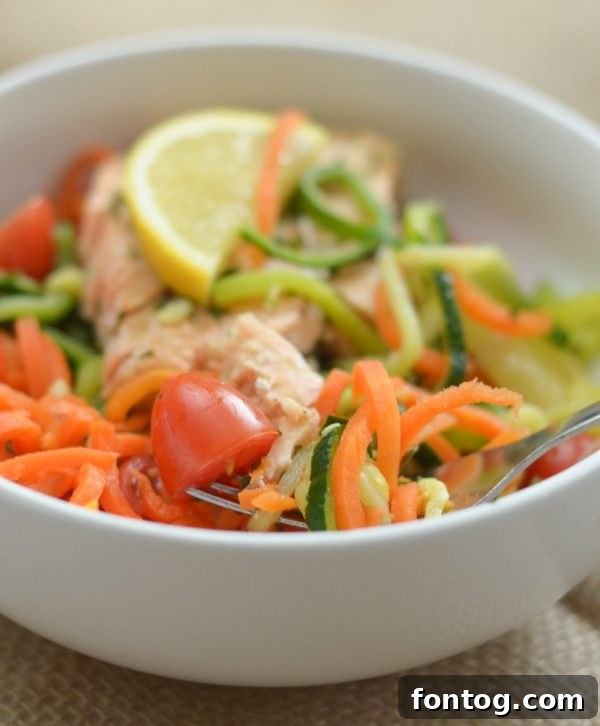 A beautifully presented Green Giant Veggie Spiral bowl, showcasing a medley of vegetable noodles, vibrant toppings, and a perfectly cooked protein, emphasizing fresh and healthy dining.