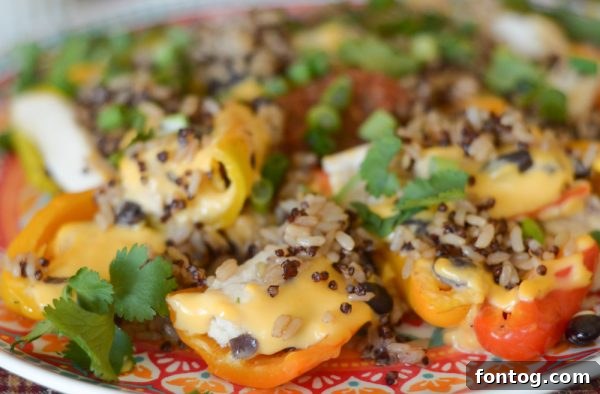 Ricos Gourmet Nacho Cheese Sauce drizzled over Sweet Pepper Nachos.