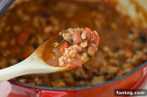 Hearty turkey chili with cornbread, ideal for a cozy night in