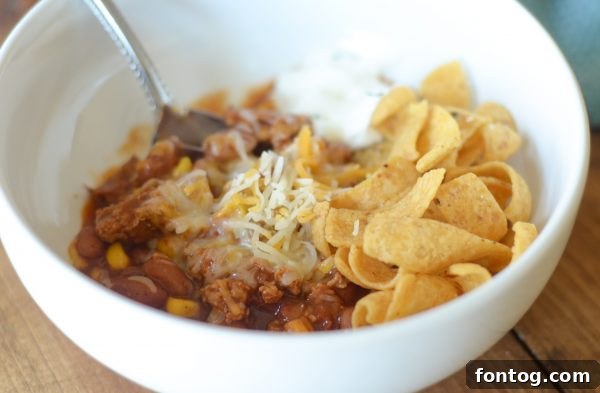 Pot of Gluten-Free Turkey & Corn Chili simmering on the stove