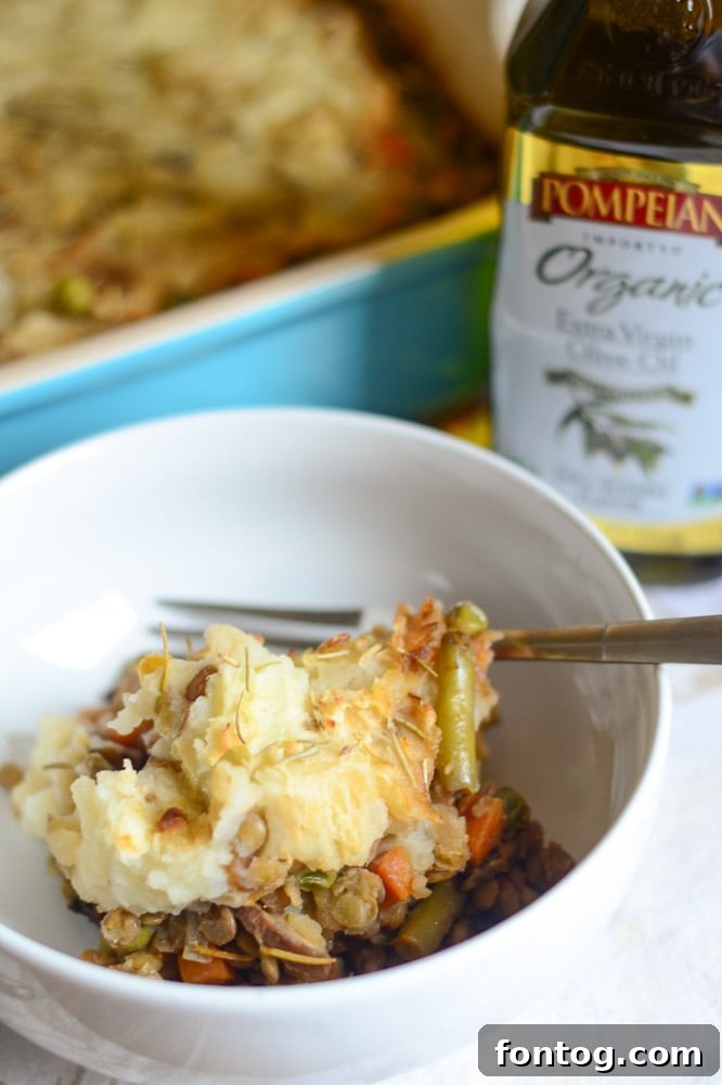 Delicious Vegan Shepherd's Pie with a golden potato topping, ready to serve.