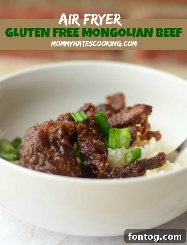 Air Fryer Gluten Free Mongolian Beef, garnished with green onions and sesame seeds
