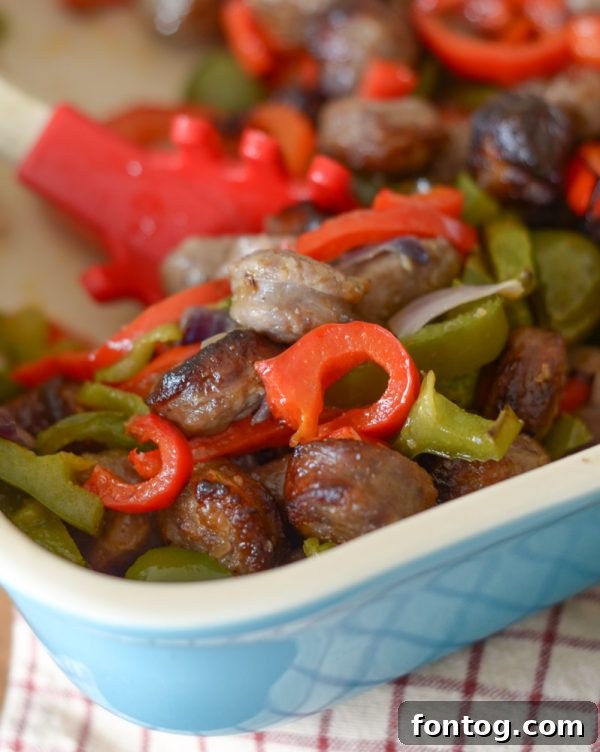 Assorted raw ingredients for Air Fryer Bratwurst and Vegetables on a wooden board