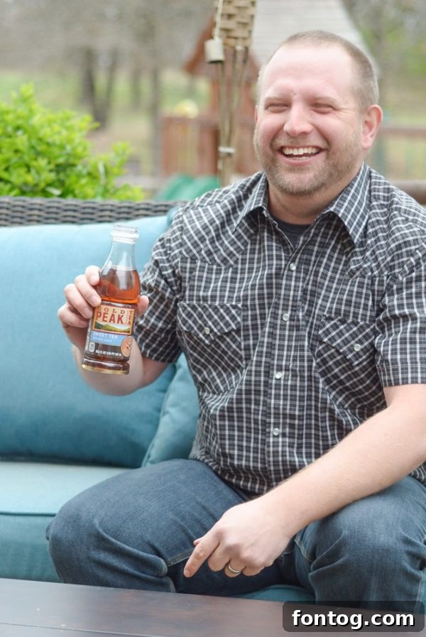 Gold Peak Sweet Tea bottles stocked in a cooler for a summer outing