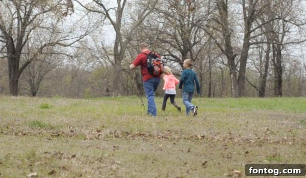A family enjoying a relaxed picnic break amidst a beautiful natural setting, highlighting the simple joys of outdoor family time.