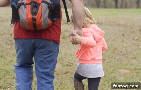 Children excitedly exploring a forest path, highlighting the wonder of nature for young adventurers.