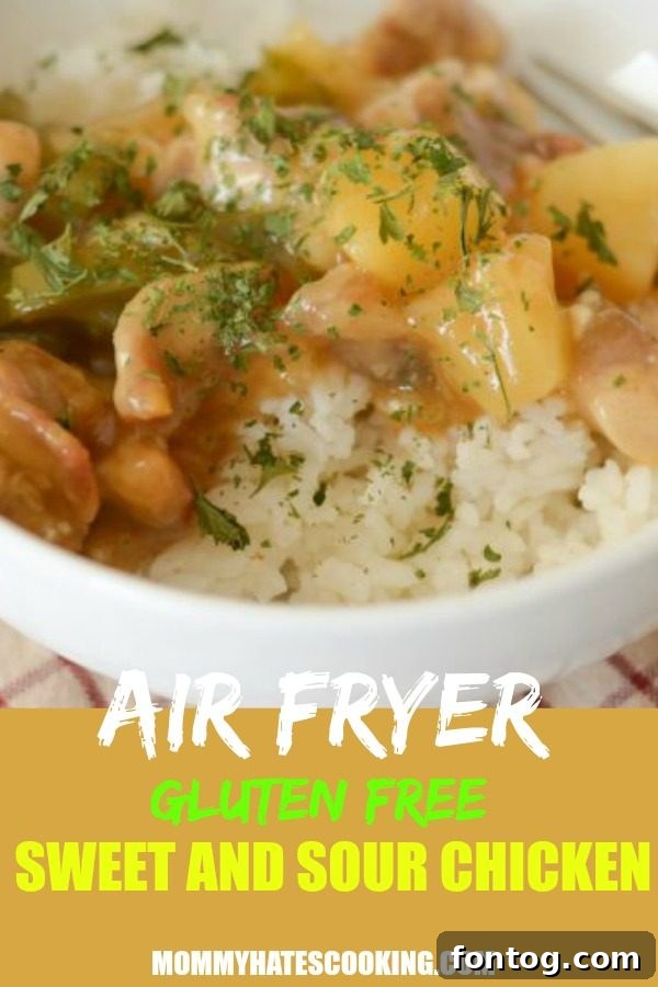Air Fryer Gluten Free Sweet and Sour Chicken dish beautifully plated with rice and green beans, a perfect family meal.