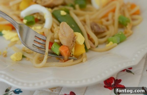 Gluten Free Chicken Pad Thai with all the garnishes, ready to eat