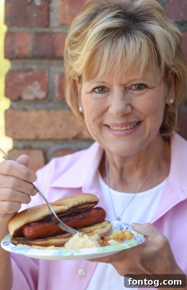 10 Summer Cookout Menu Staples for a Flawless Feast 16 Table setting with paper plates and decorative serving trays for a cookout. #SummerCookout #MasterSummer