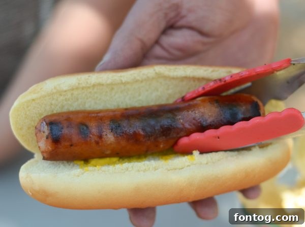 10 Summer Cookout Menu Staples for a Flawless Feast 3 Family enjoying a summer cookout with delicious food and outdoor fun. #SummerCookout #MasterSummer