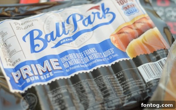 10 Summer Cookout Menu Staples for a Flawless Feast 6 Arrangement of various meats and buns for a large summer cookout. #SummerCookout #MasterSummer