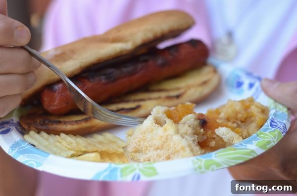10 Summer Cookout Menu Staples for a Flawless Feast 9 Ready-to-serve food setup for an outdoor summer cookout party. #SummerCookout #MasterSummer