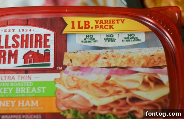 Irresistible Ham and Cheese Popovers 7 Popovers actively rising and turning golden in the oven, showcasing the baking process.