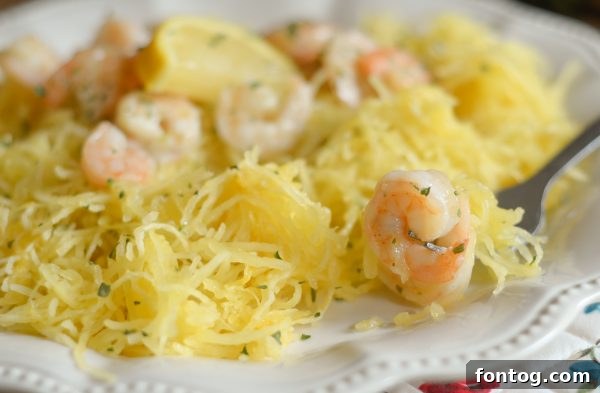 A close-up of the prepared Gluten-Free Shrimp Scampi with Spaghetti Squash, showing the delicate strands and succulent shrimp.