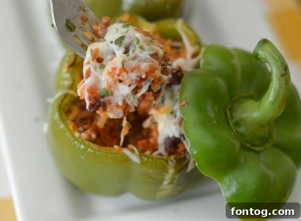 Crispy Air Fryer Stuffed Peppers 3 Air Fryer Stuffed Peppers cooking in the basket