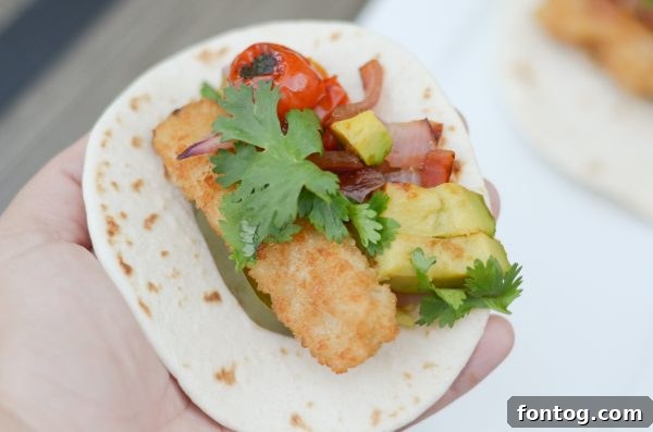 Freshly grilled Crispy Fish Street Tacos topped with cilantro