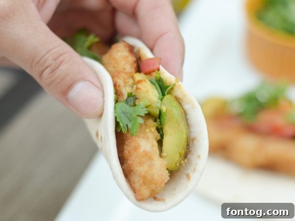 Enjoying Crispy Fish Street Tacos with friends and family