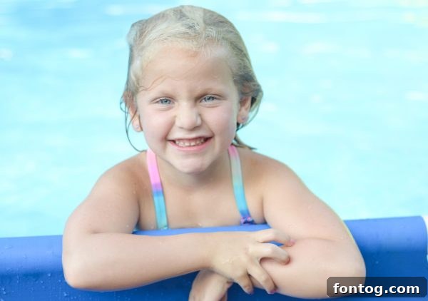 Summer Ice Pop Bash 8 Children enjoying refreshing ice pops while playing in a swimming pool