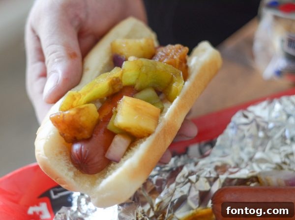 Grilled Hawaiian Hot Dogs with fresh salsa toppings