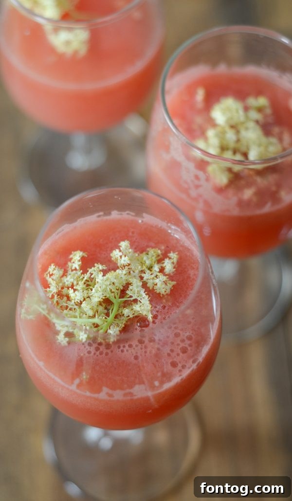 Watermelon Pineapple Punch with Elderflower, a vibrant and healthy summer drink