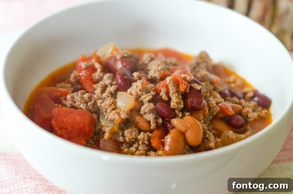 Full bowl of Instant Pot Hearty Bean Chili, ready for toppings