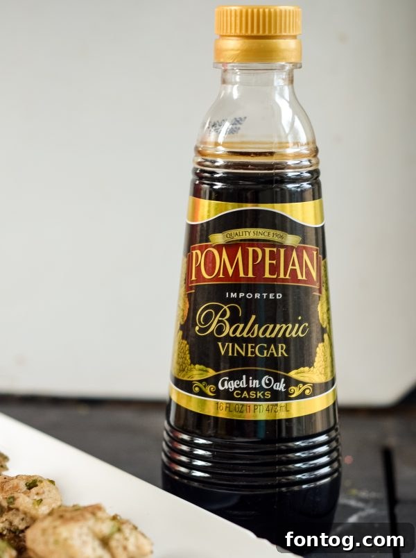 Balsamic Kissed Stuffed Mushrooms 7 Platter of freshly baked Balsamic Glazed Stuffed Mushrooms with parsley garnish.