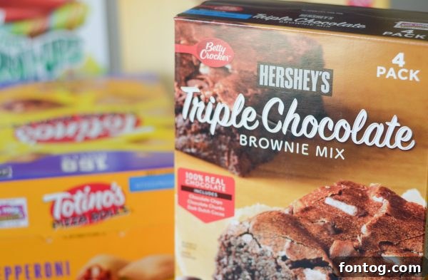 Empower Education with Box Tops 4 Delicious Box Tops for Education snacks and lunch items arranged on a counter after a Sam's Club haul