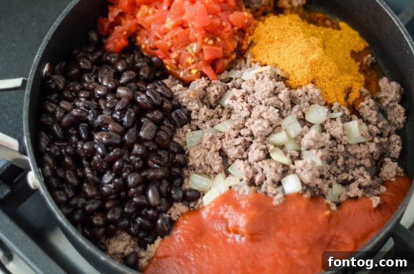 Preparing Gluten-Free Mexican Lasagna with corn tortillas