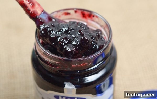 Close-up of the crumb topping on a baked Black Currant Crisp.