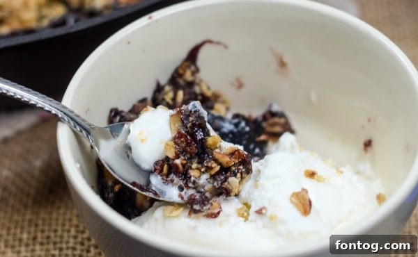 Close-up of the black currant filling under the crisp topping.