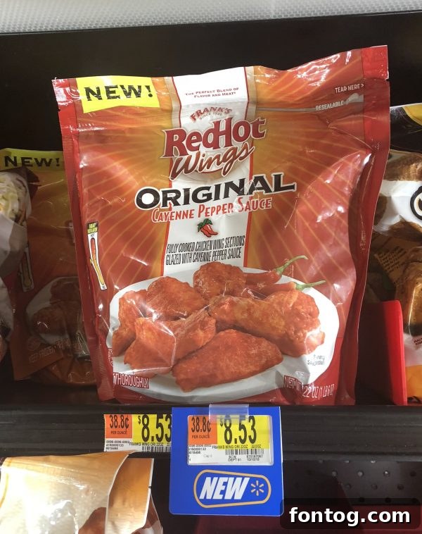 A plate of freshly baked Frank's RedHot Wings, still glistening with sauce.