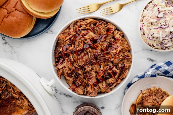 Slow cooker pulled pork, perfect for sandwiches.