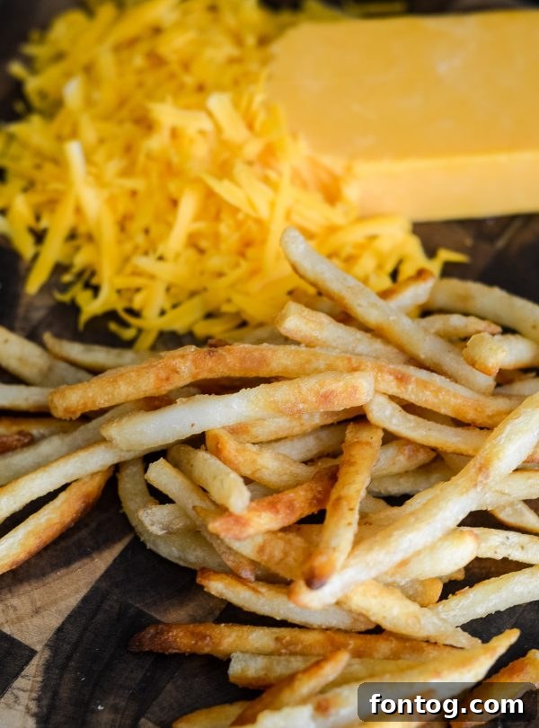 More Beer Battered French Fries ready for toppings