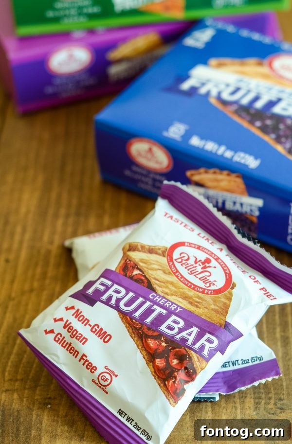 Close-up of a Betty Lou's Fruit Bar, highlighting its wholesome texture and fruit filling.