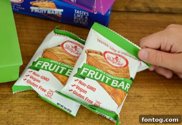 A Betty Lou's Fruit Bar wrapper, emphasizing its gluten-free and vegan attributes.