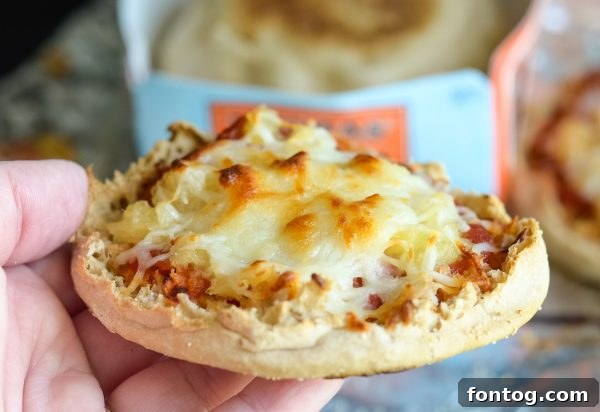 Finished Air Fryer Hawaiian Pizzas on English muffins