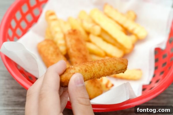 A family enjoying a meal together, symbolizing the benefits of kids learning to cook and eat healthily.