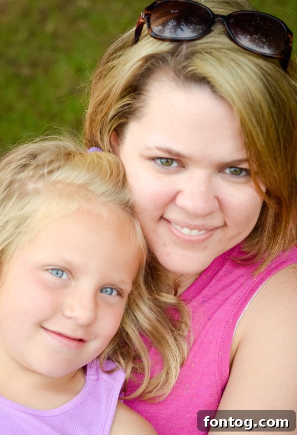 Close-up of a child listening intently to a campfire story